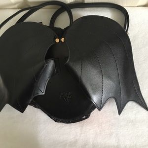 Heart shape wing backpack